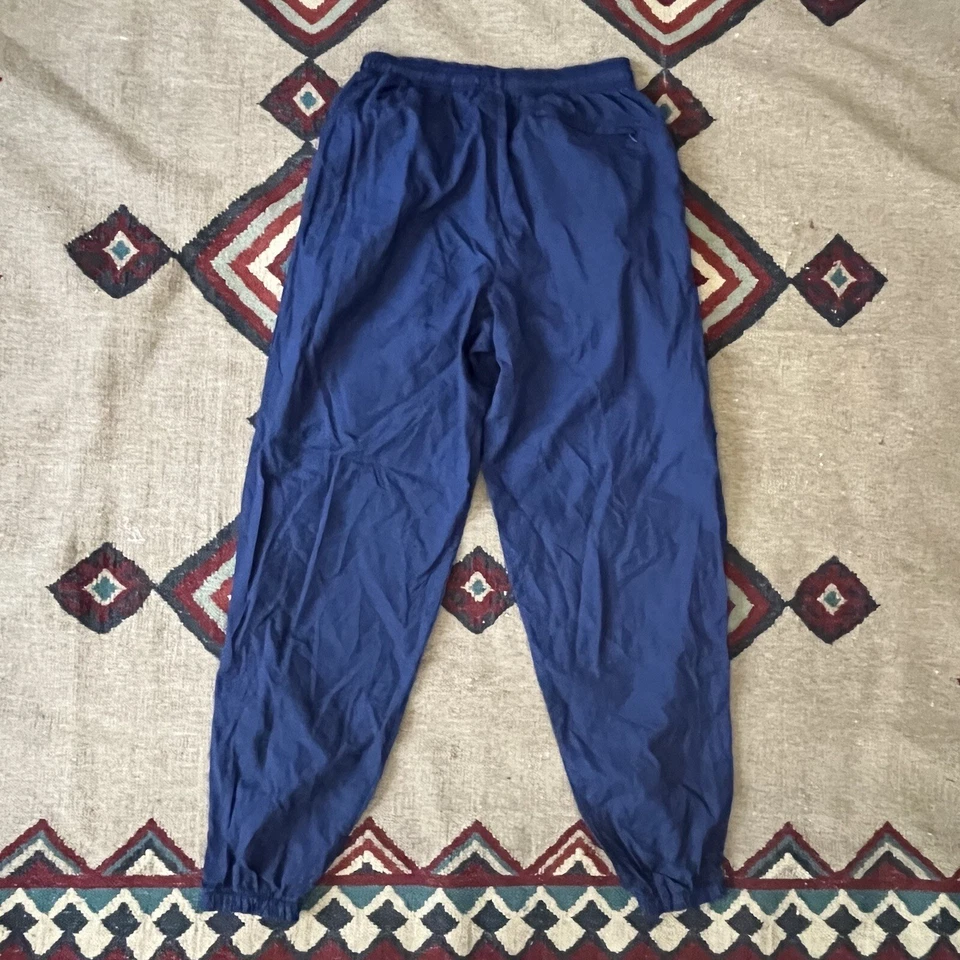 Pantalones cortavientos Nike vintage de los 90 para hombre grandes de nailon azul marino Foto 4 de 4