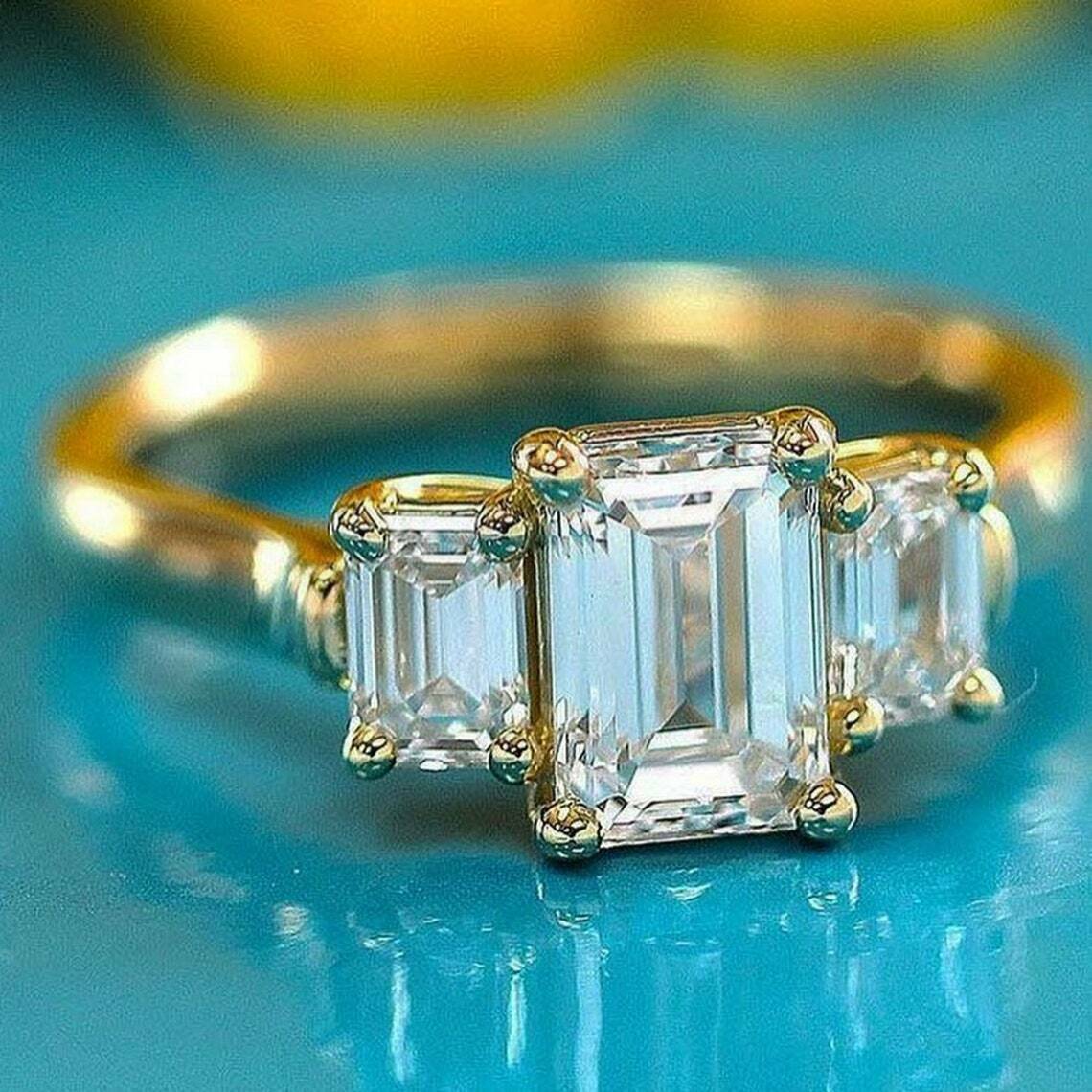 14k White Gold Diamond & Emerald 3-Stone Ring 14k White Gold Diamond & Emerald 3-Stone Ring