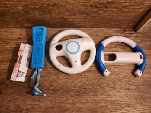 Blue Nyko Wand Wii Controller With Case and official wii wheel controller - Afbeelding 1 van 4