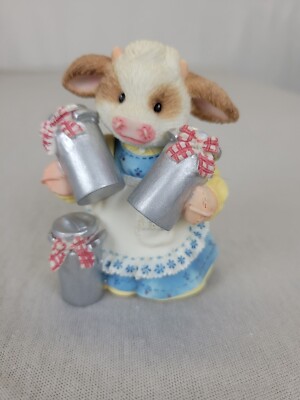 Marys Moo Moos  You re An Udder Delight  319384 Girl Cow Holding Milk Figurine