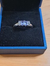 Tanzanite and white topaz 3x4mm .49tcw sterling silver. 925 size 7 ring.