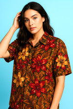 Vintage tropical floral button-down shirt with short sleeves, size large.