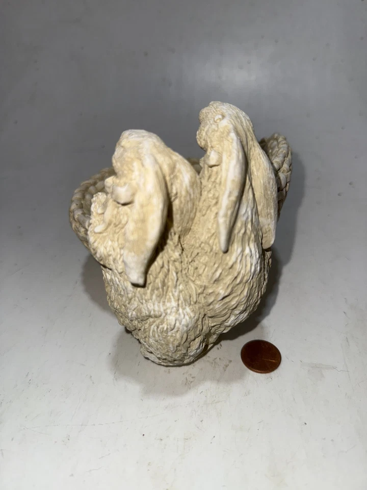 Conejos de cerámica con cesta originales de California Foto 3 de 4