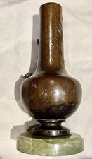 Bronzed White Metal Vase Mounted On A Onys Base , Bird, Sheaf Corn And Scythe