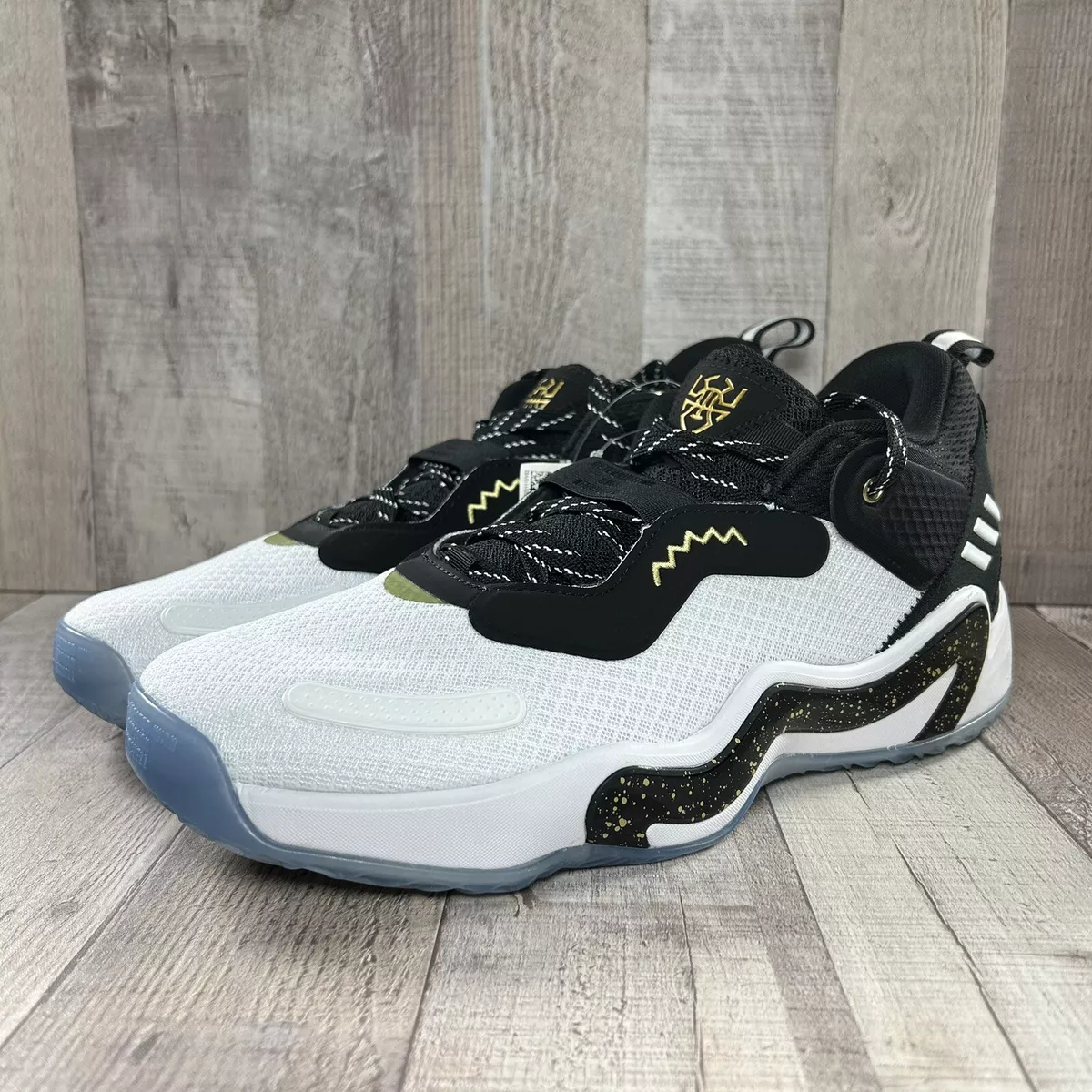 Black and sales gold phones shoes