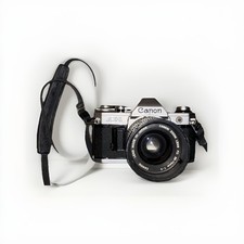 Canon AE-1 35mm Manual SLR Film Camera with 35-70mm Lens Tested Working