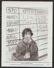 A Small Circle Of Friends ’80 BRAD DAVIS HOLDING A CRUCIFIX