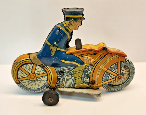 Vintage Marx 8.5" Tin Wind-up Policeman on a Motorcycle. Incomplete but Works