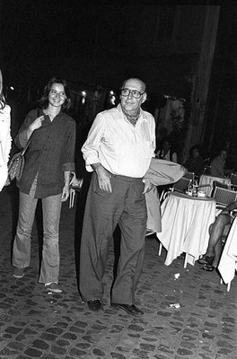 Roberto Rossellini in the street by night with his daughter Italia- Old Photo