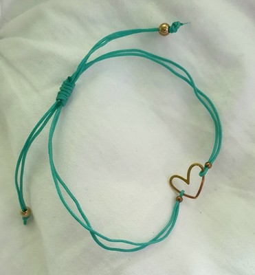 Adjustable Bracelet with Heart Shaped Pendant