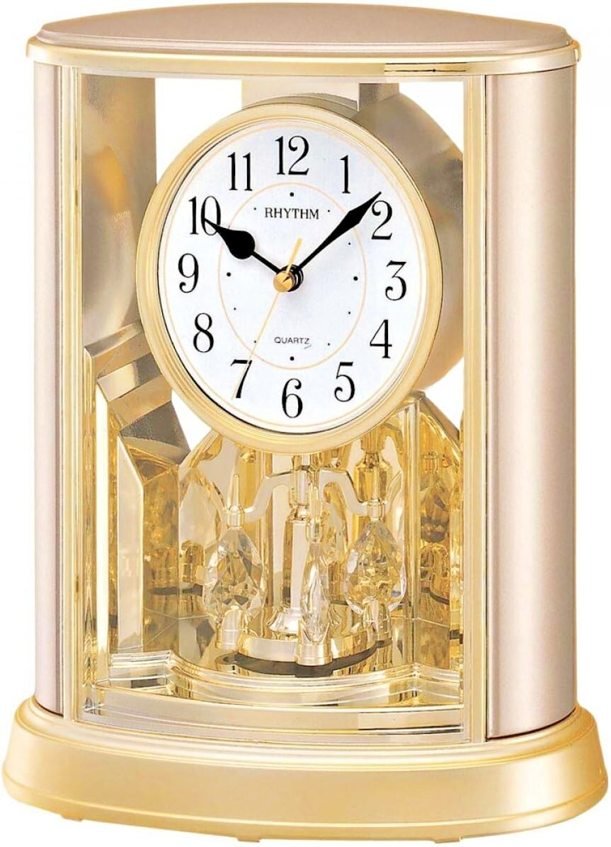 Rhythm Mantel Clock 2 Tone Oval Rotating Pendulum Crystal Arabic Dial 4SG724WR18