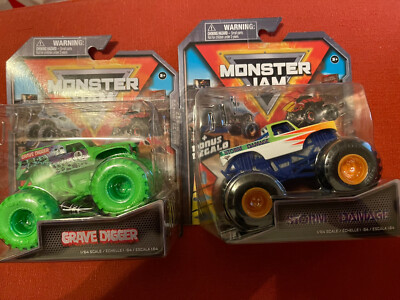 Spin Master Monster Jam 2022 Green Grave Digger & Storm Damage