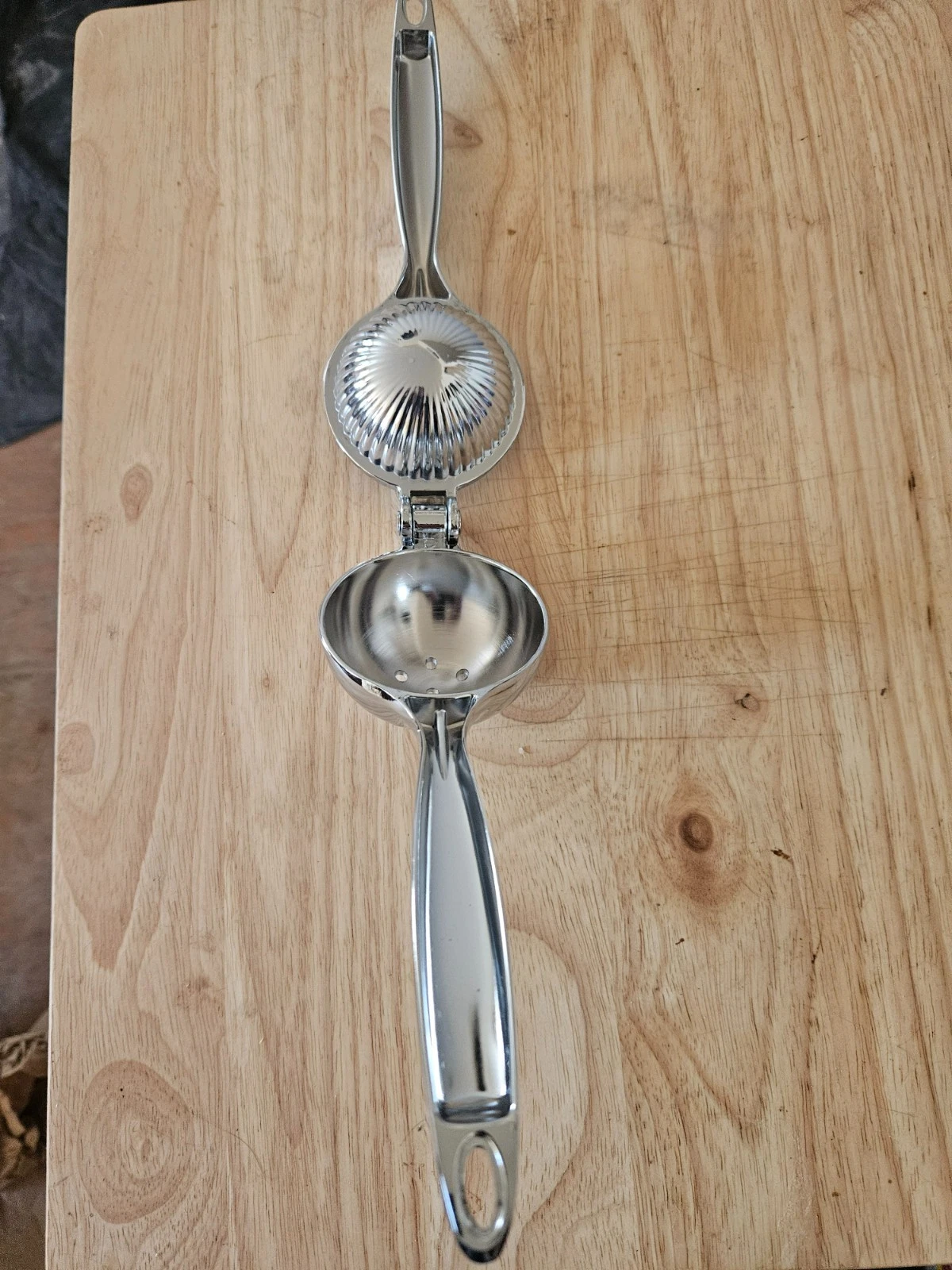 lemon squeezer wire whisk and tongs