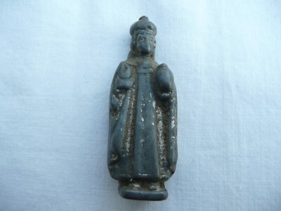 small antique religious statue in order