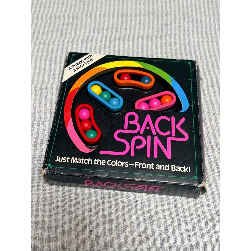 Vintage 1991 Back Spin Handheld Puzzle Brain Teaser Game