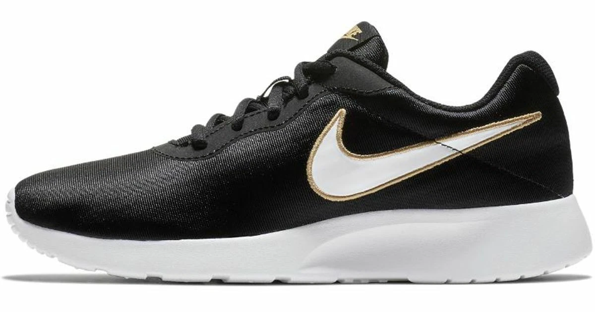 Womens nike tanjun clearance black and gold
