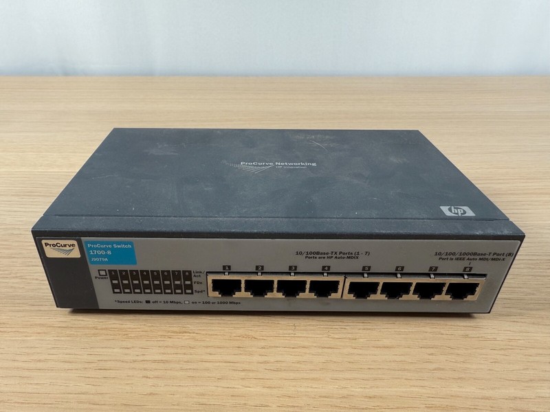 NEW HP ProCurve 1700-8 8 Port Fast Ethernet Switch (7x 100Mbps, 1x 1Gbps) J9079A