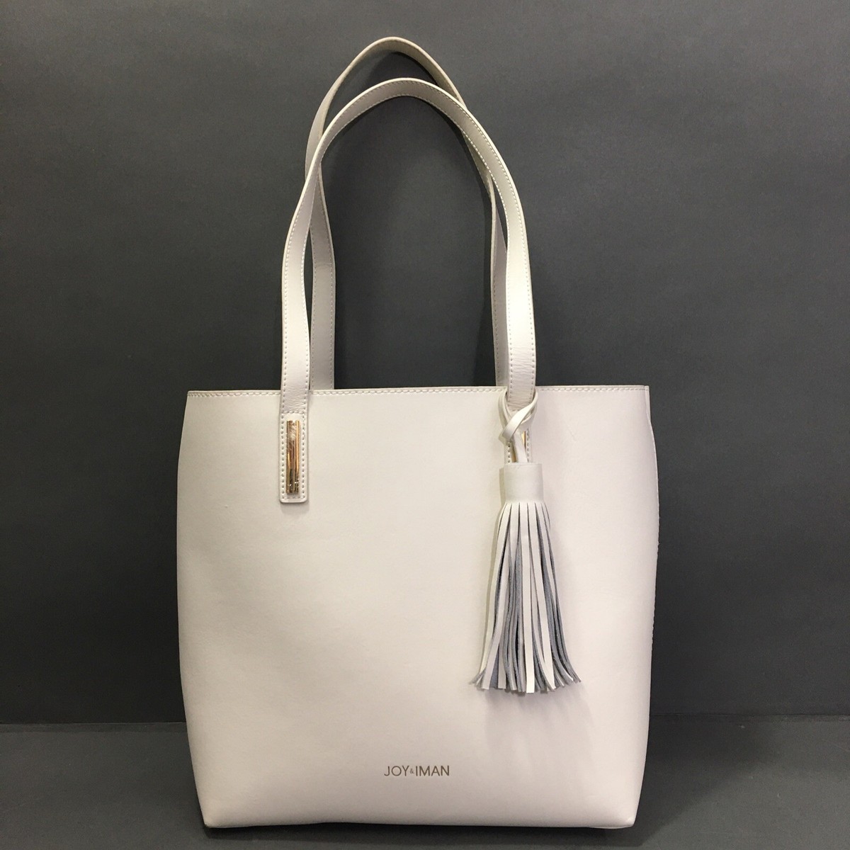 JOY IMAN White Tassel Chic Leather Handbag with Fabric insert