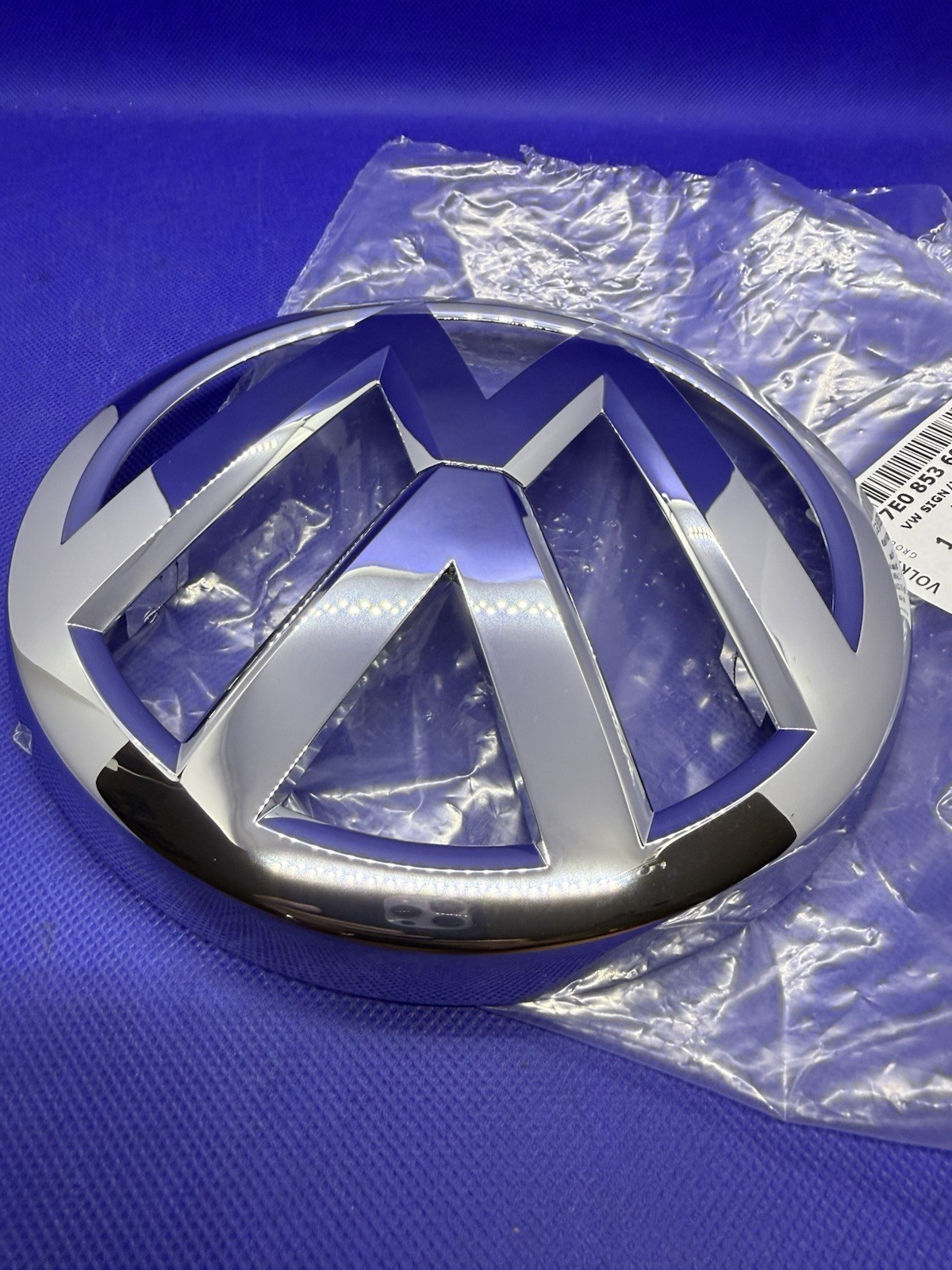 Badge calandre VW Transporter Crafter emblème de grille avant 7E0853601G