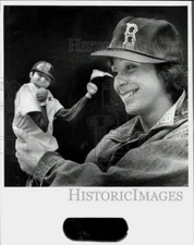 1988 Press Photo Mary Bassols admires a Boston Red Sox souvenir - lra20408