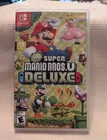 Nintendo New Super Mario Bros. U Deluxe - Switch, E, Multiplayer w/ Case