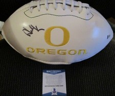 PHIL KNIGHT OREGON DUCKS SIGNED LOGO FOOTBALL BECKETT BAS COA S50091