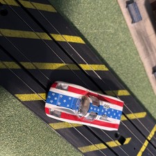 Tyco pro Porsche red/white/blue and stars running chassis with lights    