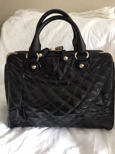quilted patent leather handbag