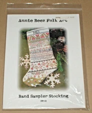 Annie Beez Folk Art Christmas "Band Sampler Stocking" Cross Stitch Pattern