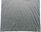 Gray VTG men’s shirt with single stitch, small pocket, and visible wrinkles on fabric.