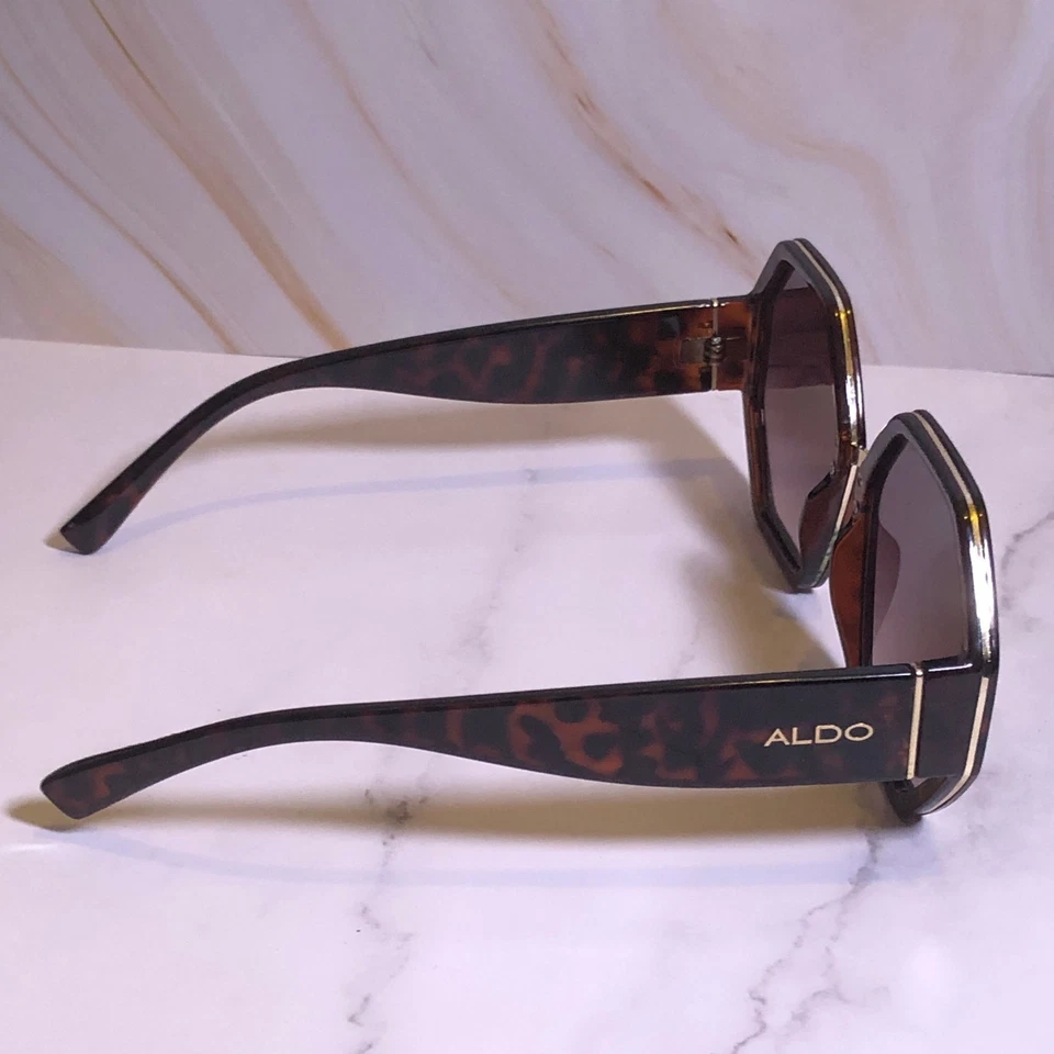 Gafas de sol retro Aldo para mujer marrón tortuga marco hexagonal patrón de panal Foto 3 de 4