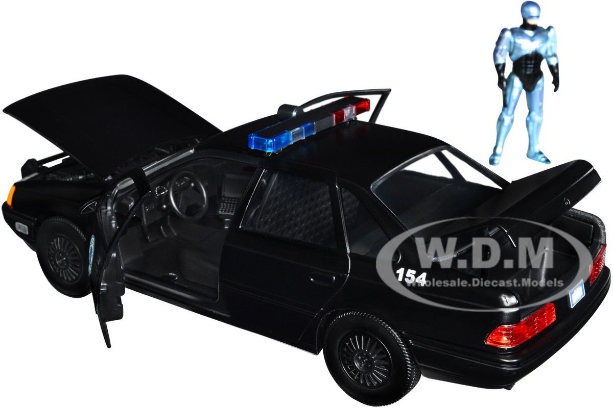 FORD TAURUS OCP DETROIT POLICE & ROBOCOP FIGURE 1/24 DIECAST