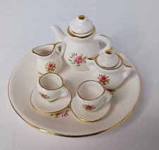 Porcelain Miniture Tea Set with Plate, Teapot, Creamer, Sugar Dish, and 2 Cups