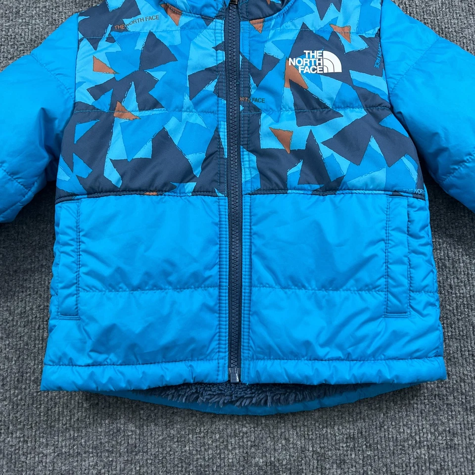Chaqueta The North Face Niños 3T Azul Con Capucha Forrada de Vellón Reversible Montaje Chimbo Foto 2 de 4