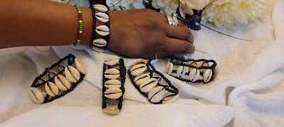 Double strand cowrie bracelet