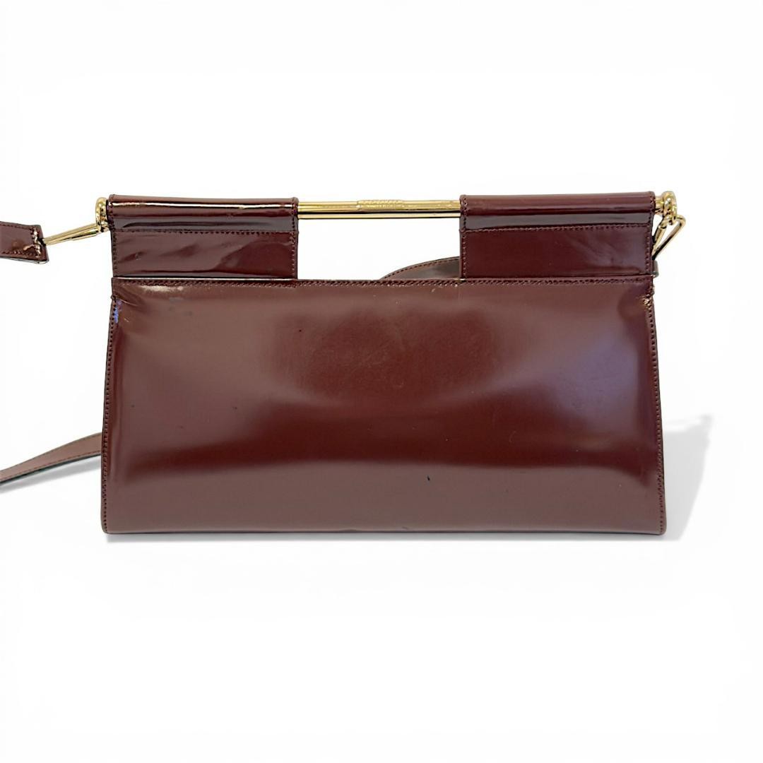 Borsa a tracolla Gucci in pelle verniciata marrone oro ferramenta vintage Italia