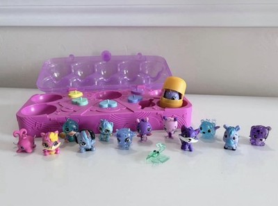 Hatchimals CollEGGtibles 14pc lot and Pink Storage Carton