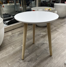 Apicizon round side table with a white top and natural wood legs