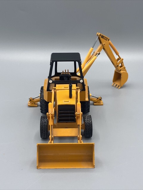 diecast case backhoe