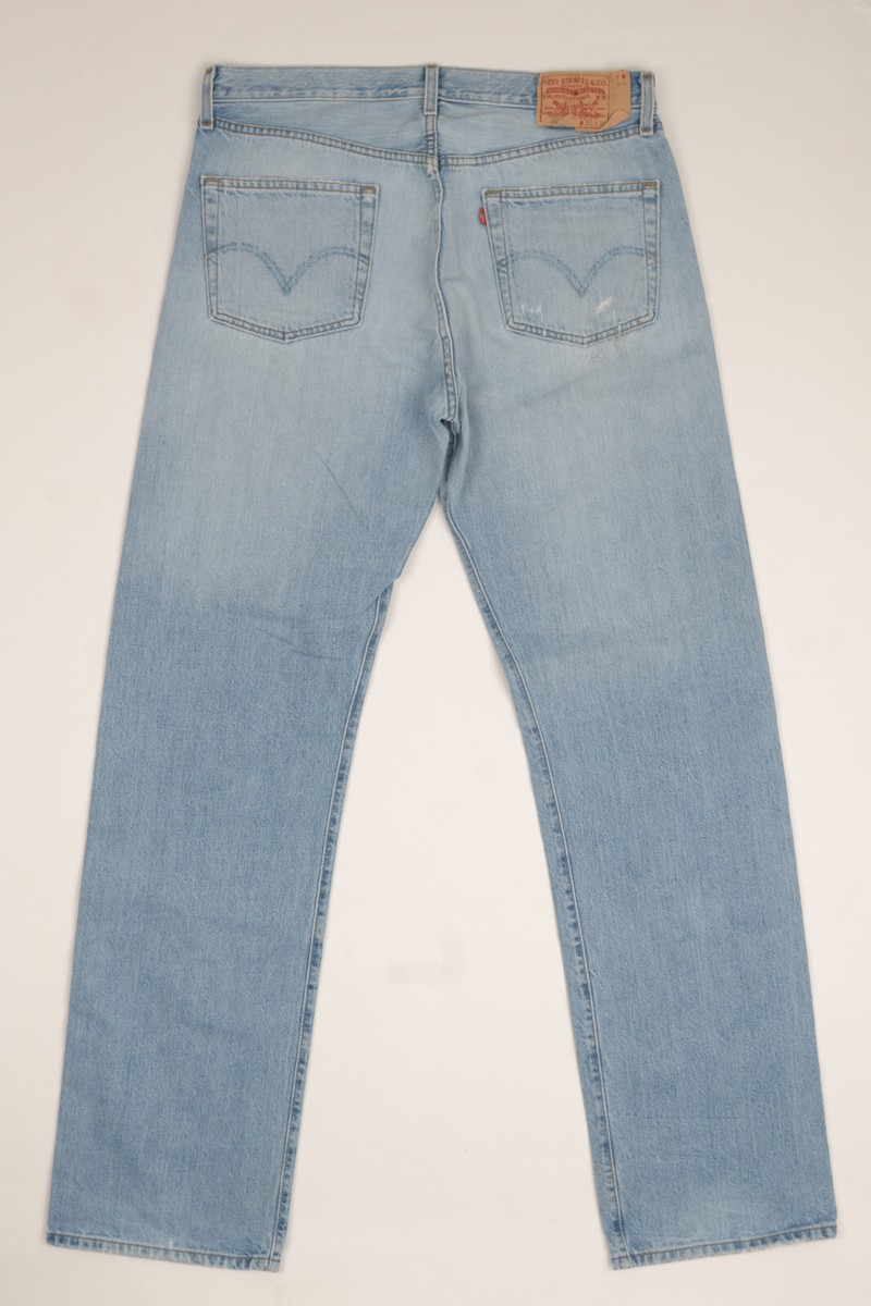 90s Vintage Levis 501 denim jeans 36x36 blue stonewash distressed