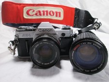 Canon AE-1 35mm SLR Film Camera With two lenses 50mm Fd & 75-200mm tested works