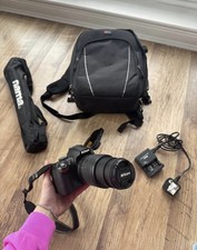 Nikon D3000 DSLR Camera - 55-200mm Lens, Tripod, Carry Bag, Charger