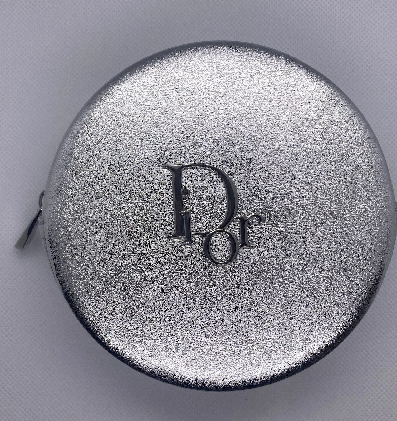 Sac à maquillage beauté Christian Dior rond argenté neuf avec étiquette