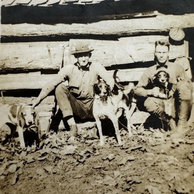 Vintage Hunting Snapshot Photo Men With Hound Dogs Log Cabin Black & White 
