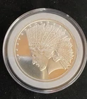 One-ounce silver round composed of .999 fine silver.