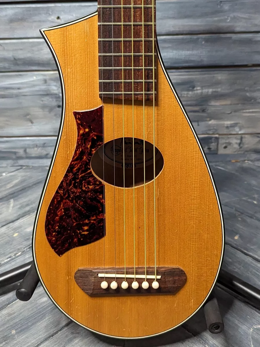 Used travel guitar deals