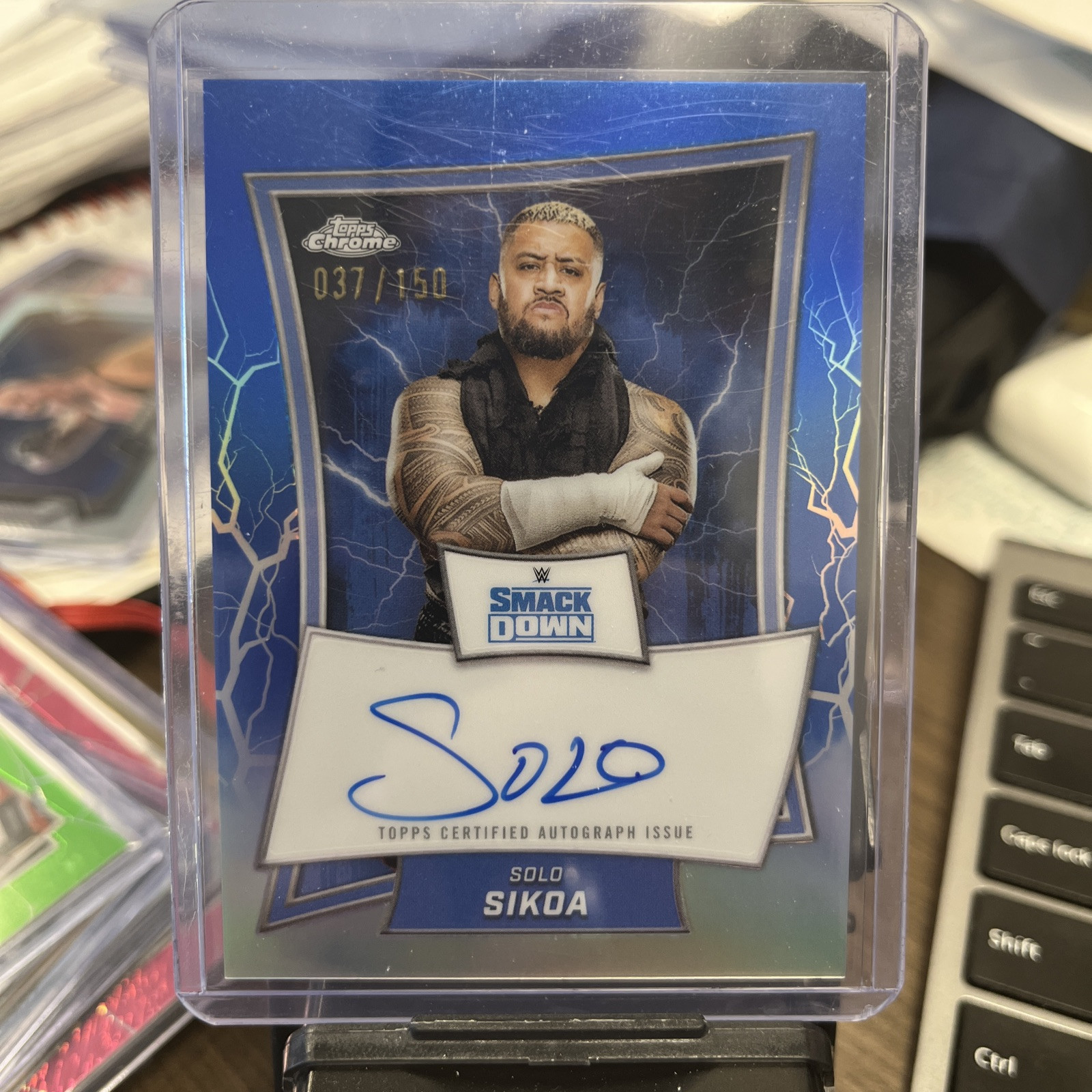 2025 Topps Chrome WWE Solo Sikoa Smackdown Blue Brand Chrome Auto Blue 37/150