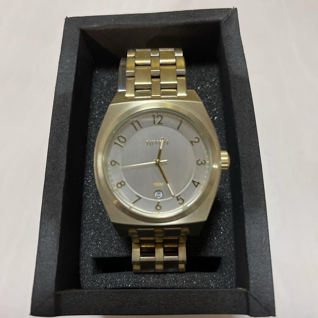Nixon Gold-Tone Watch for Men and Women - Stylish Timepiece