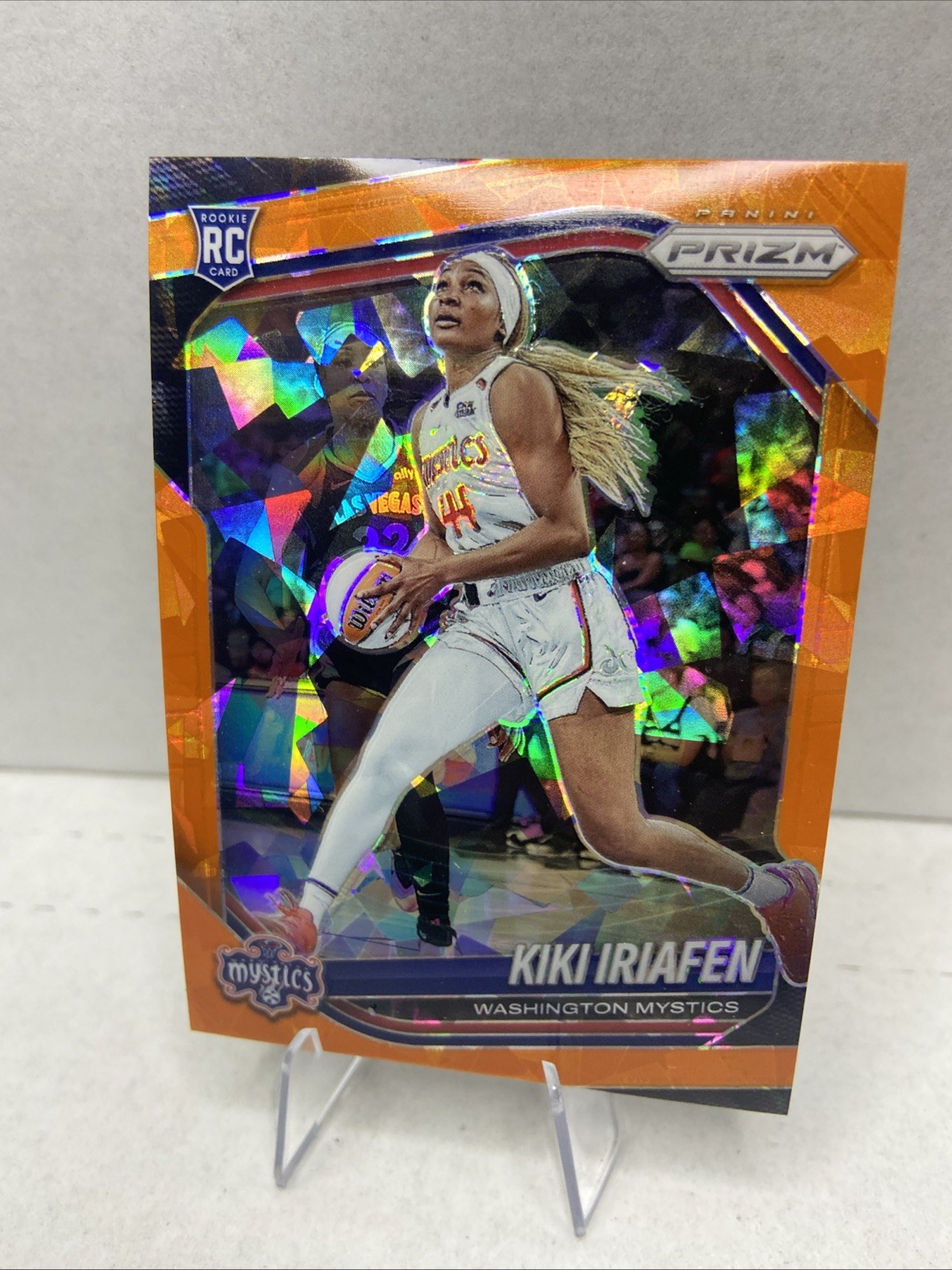 2025 Panini Prizm WNBA #72 Kiki Iriafen Orange Cracked Ice Washington Mystics RC