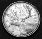 1963 25¢ silver coin in a paper flip    1.0